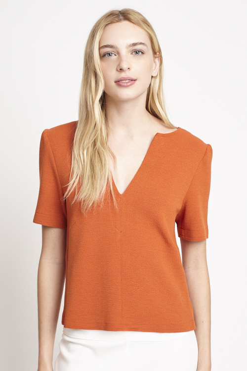 blusa bouclê decote V