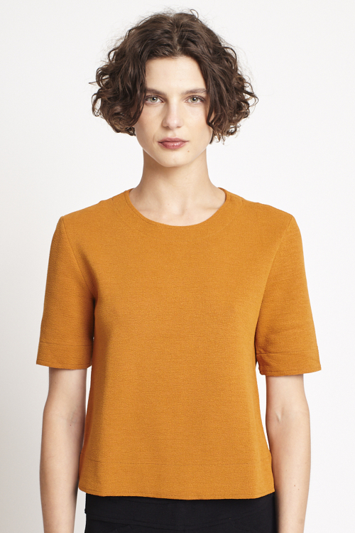 blusa bouclê manga curta