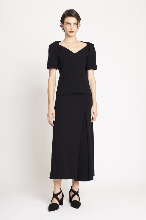 blusa bouclê ombro torcido